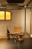 set diseñado por MINIM a partir de MAIO y sus influencias. Butaca de Fritz Hansen, mesa auxiliar Vitra Cork, taburete a partir de T300 de Curro Claret, Luminator de Flos y Jarrón de Chapapote de Curro Claret