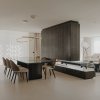 Comedor con mesa Wedge de Minotti y salón al fondo, MINIM Barcelona