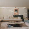 Sofá y mesa de centro MINOTTI en el salón con aparador BRAMANTE de Cassina en laca brillo verde, MINIM Barcelona