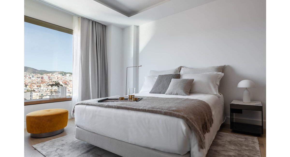 Vivienda en el corazón de Barcelona MINIM mobiliario iluminación